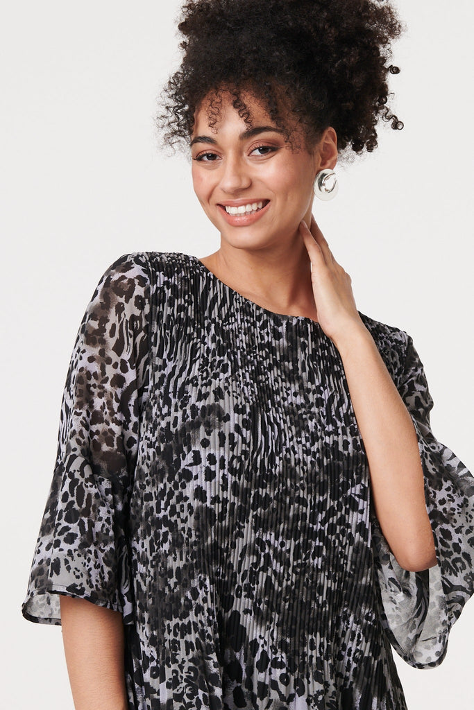 Animal Print Sheer Pleated Blouse