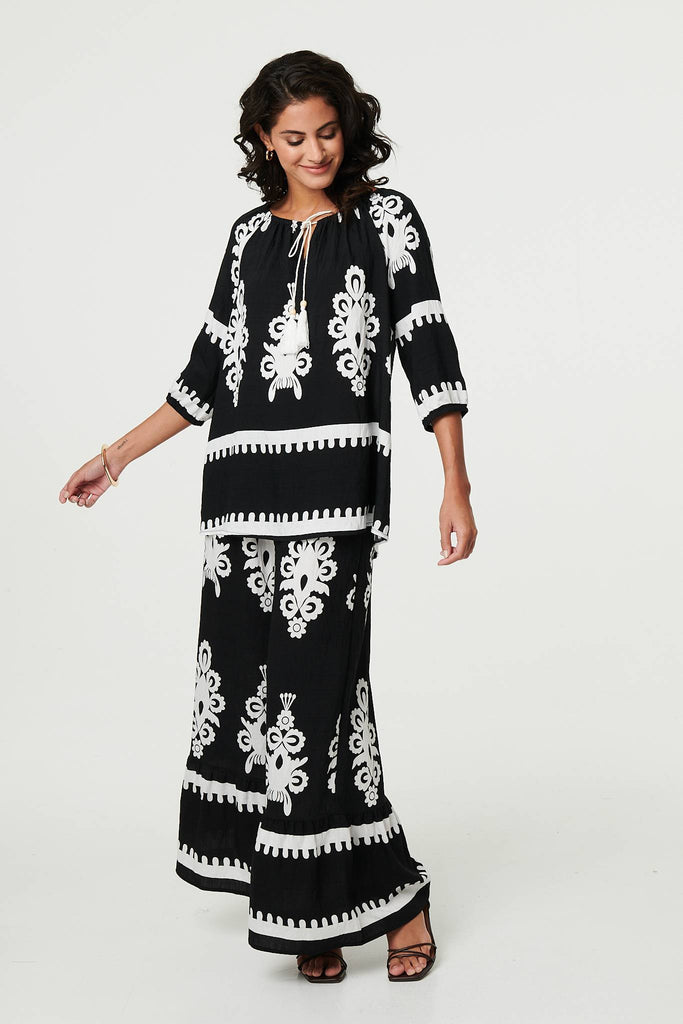 Ikat Print Tassel Tie Neck Blouse