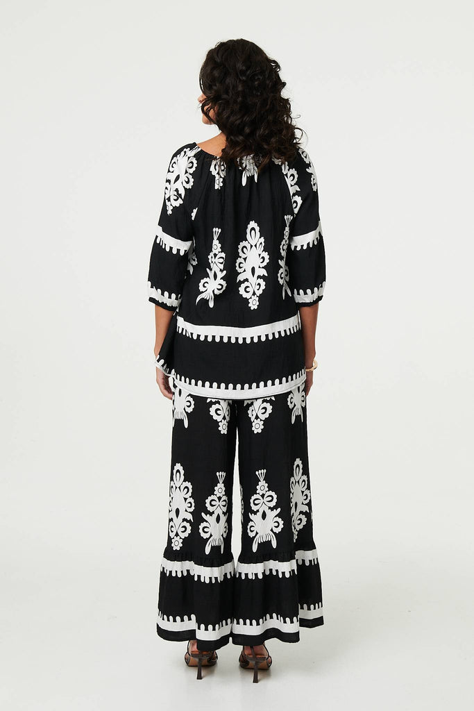 Ikat Print Tassel Tie Neck Blouse