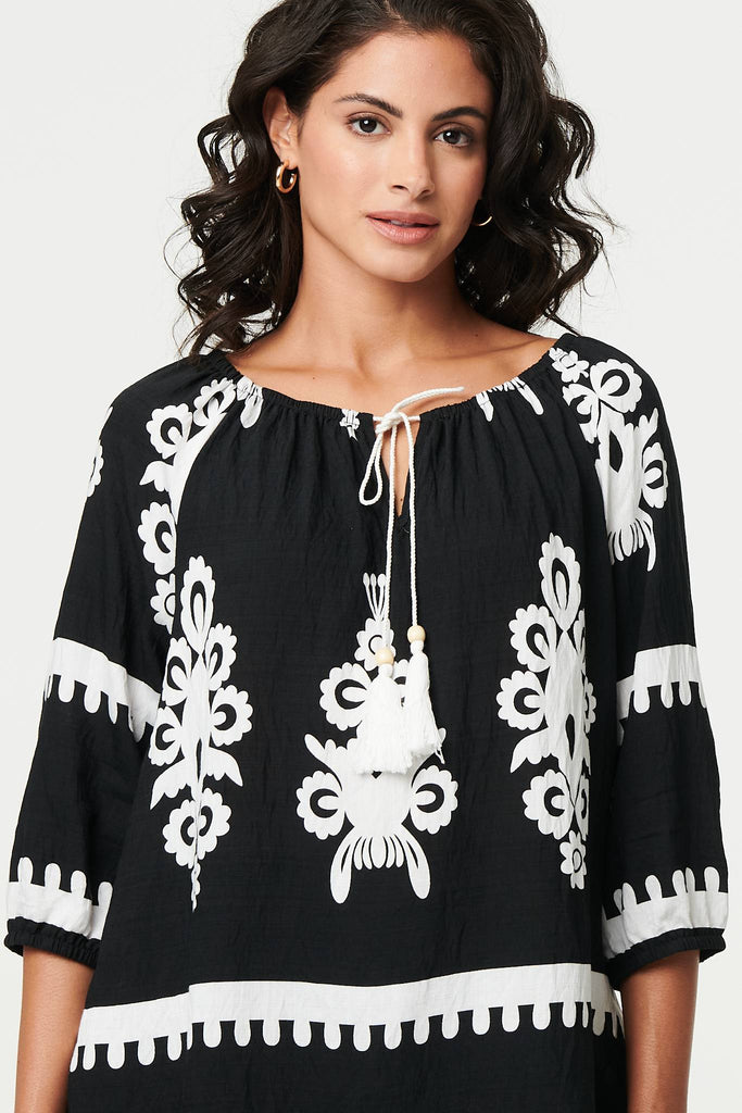 Ikat Print Tassel Tie Neck Blouse